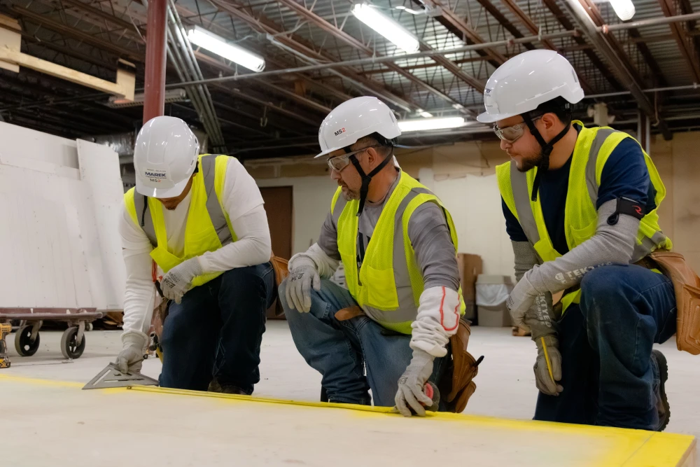 MAREK Construction team working together on site.