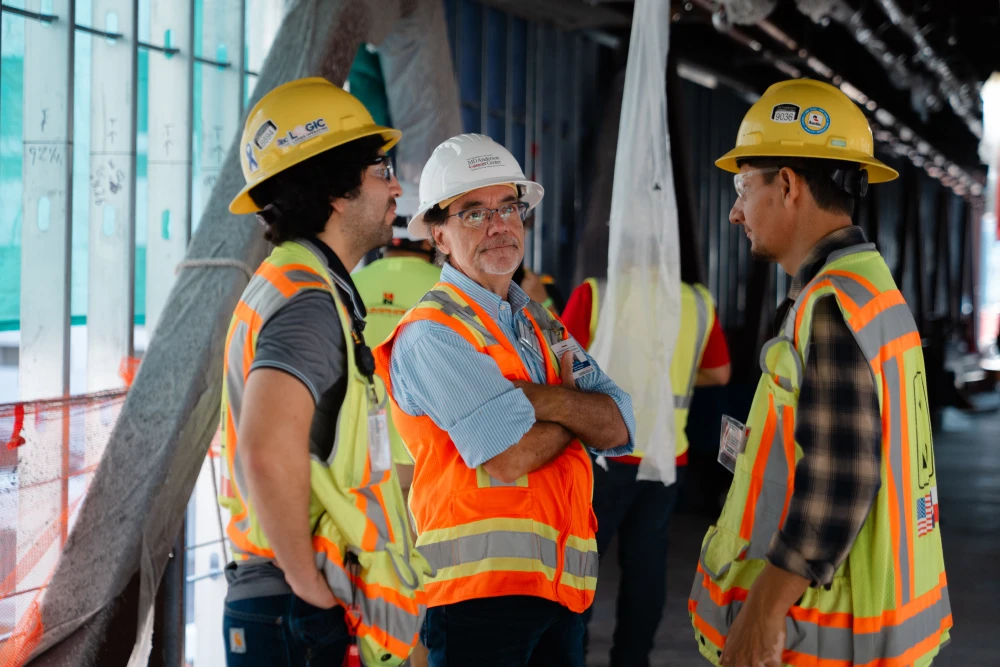 MAREK team discussing project.